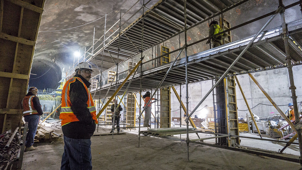 Concrete slab finishing at a construction site